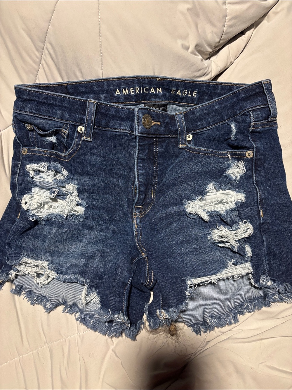 American Eagle Outfitters Navy Distressed Denim Cutoff Shorts - The Dream Short